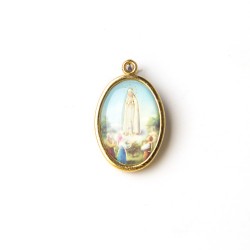 Medaglia ovale dorata della Madonna di Fatima