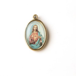 Medaglia ovale dorata del Sacro Cuore di Gesù