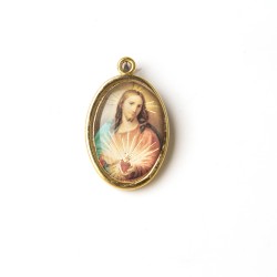 Medaglia ovale dorata del Sacro Cuore di Gesù