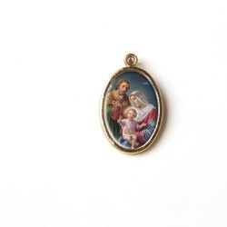 Medaglia ovale dorata della Sacra Famiglia
