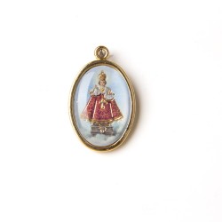 Medaglia ovale dorata del Santo Bambino di Praga