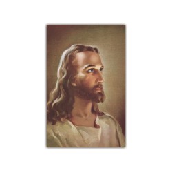 Stampa in formato postale con il volto di Cristo